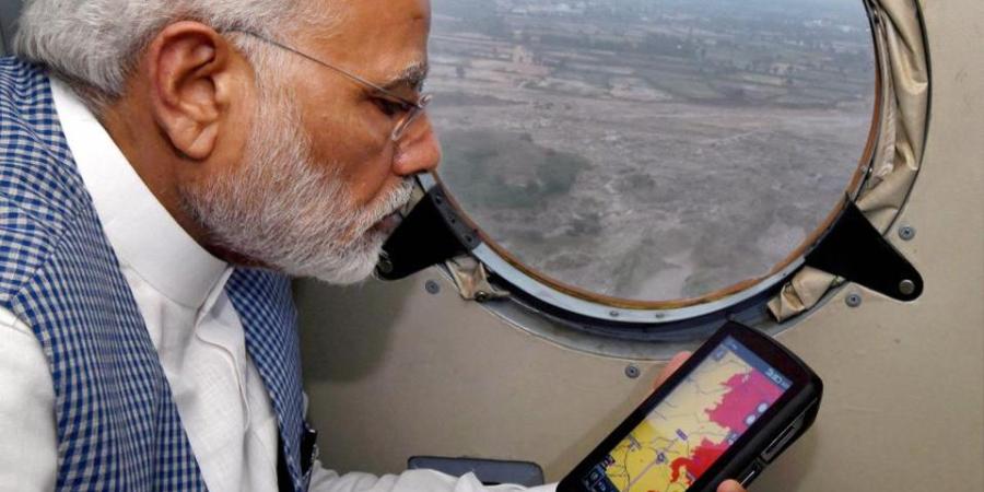 Prime Minister Narendra Modi conducting an aerial survey of flood affected areas of Gujrat, Photo: H.T.